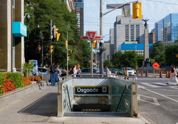 entrance to Osgoode subway station on the southwest corner of Queen and University