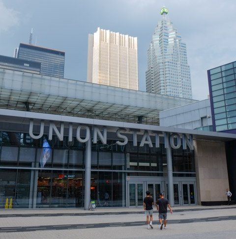 south entrance of Union Station, at Maple Leaf Square, with tall office buildings behind, 