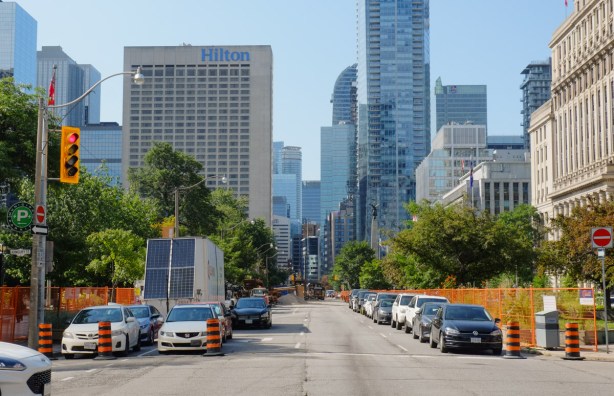 looking south on University Ave from Armoury street where one side of the boulevard is closed to traffic because of subway construction