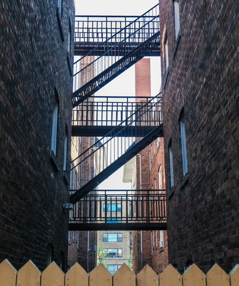 elevated corridors, open to outside, linking buildings