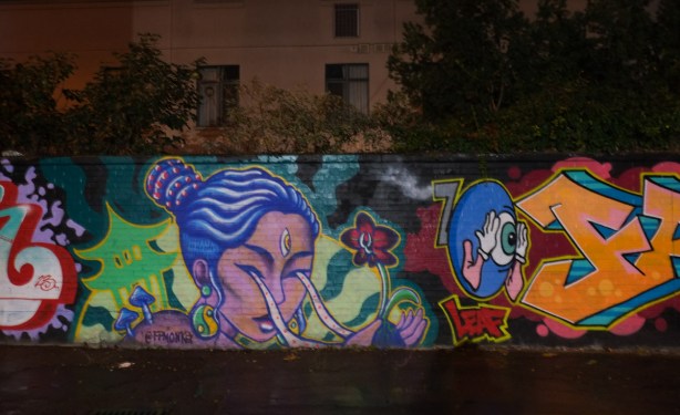 mural in graffiti alley, collaboration of three artists, FP monkey, aka Julia H. 