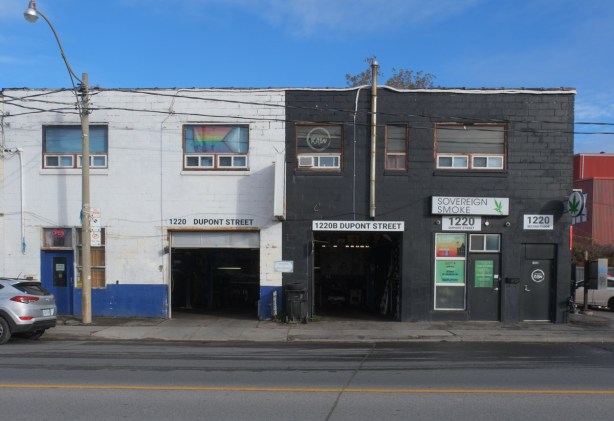 line of tire shops and mechanics, with sovereign cannabis there too
