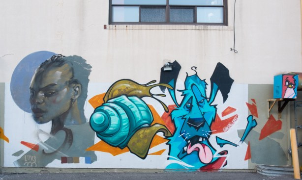 luvs and cas mural in north york alley