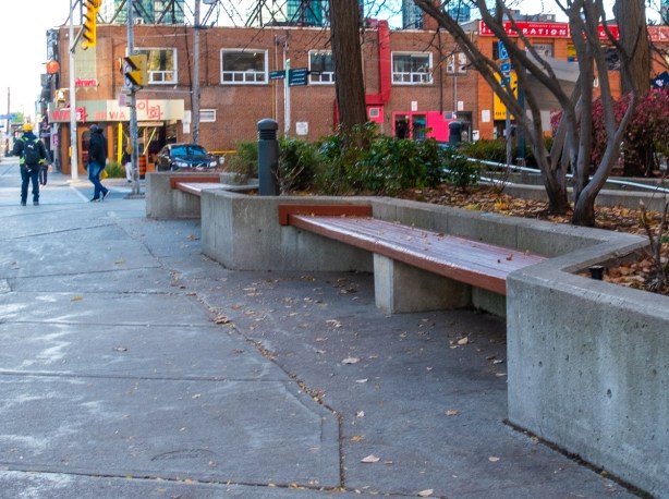 benches along the sidewalk on Yonge street