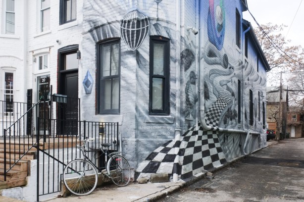 mural in blues and greys with title Math Meets Art on old brick building in Kensington