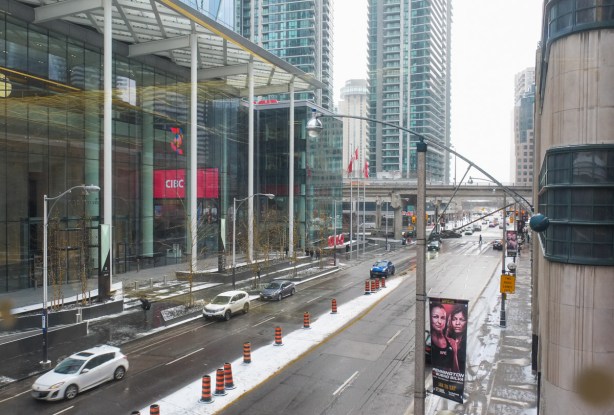 view south on Bay street from pedestrian bridge south of railway tracks that joins union station to cibc square