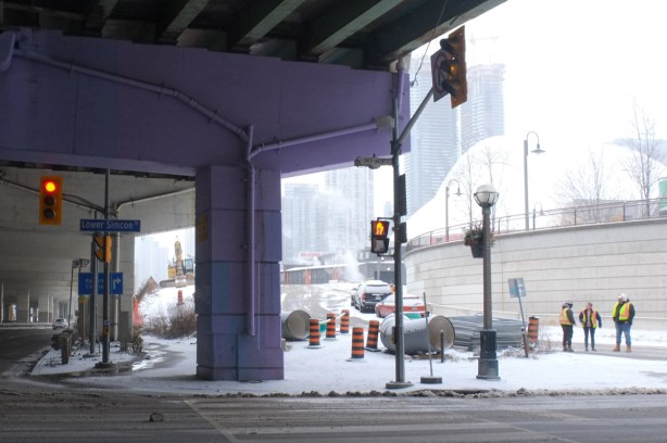 construction beside the Gardiner expressway, raised road, winter, 