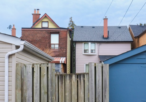view of adjacent houses from the alley behind