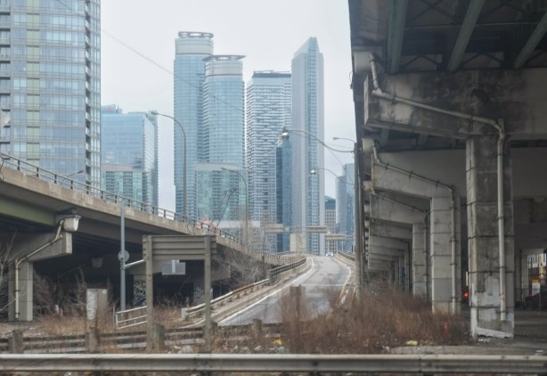 ramp to the gardiner expressway, plus upper levels of the gardiner, looking east from spadina