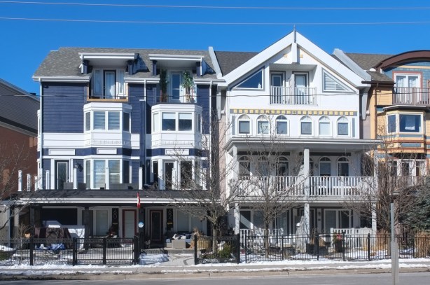 row of four storey residential buildings on woodbine avenue