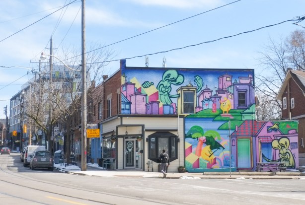 poser bunny mural on the side of a two storey structure on gerrard street