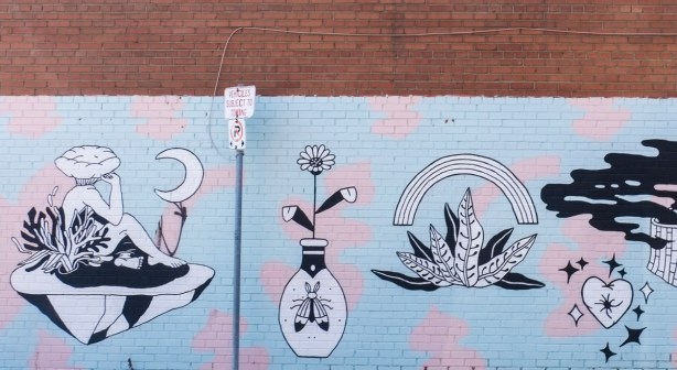 mural on the side of whole foods store