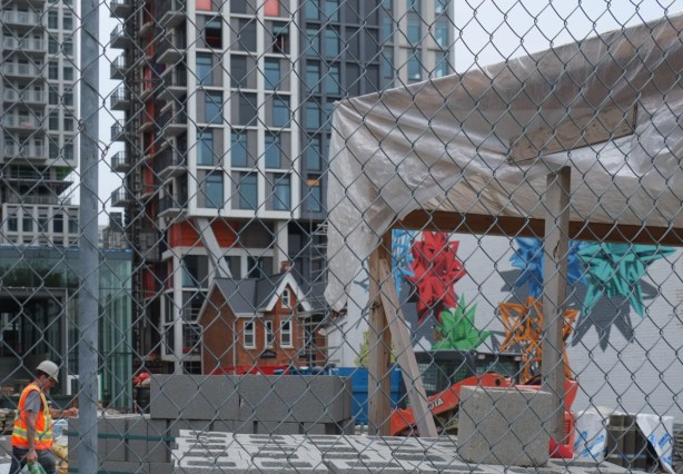 Markham street, old mirvish village, redevelopment, small house among the highrises