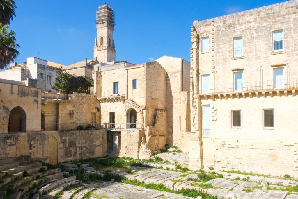 Roman amphitheater and other old stone buildings in Lecce Italy