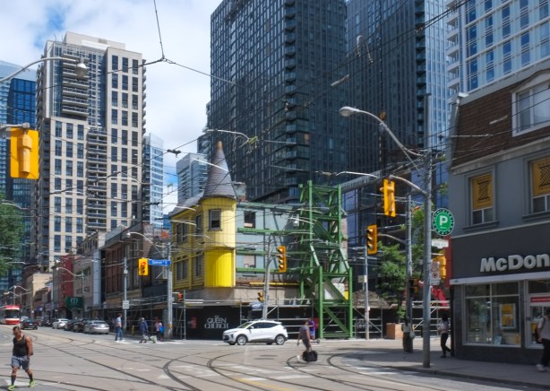northeast corner of Queen and Church, yellow tower on yellow building now being demolished