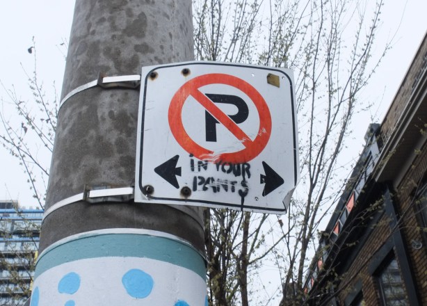graffiti, words, altered no parking sign with text in your pants, i.e. no peeing in your pants