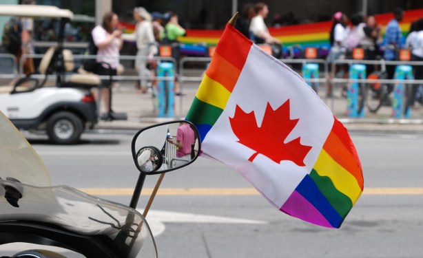 canadian pride flag on a motorcycle