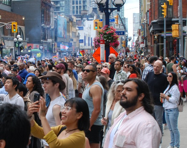 crowds on yonge street during toronto pride parade 2024