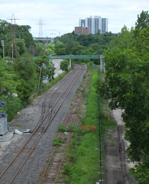 view looking north from gerrard street bridge, railway tracks, don river, view to bloor street and beyond