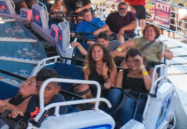 riders spinning backwards, midway ride, cne, 