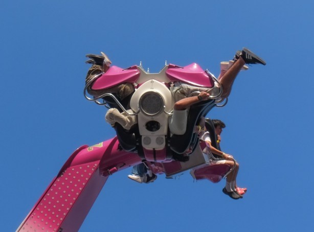 riders, some upside down, midway ride