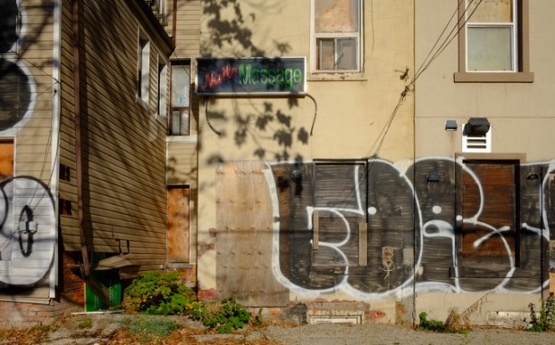 graffiti on back of abandoned houses