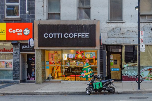 yonge street, motorbike parked outside cotti coffee