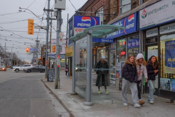people walking north on coxwell from gerrard