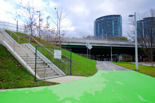 new stairs and bike path infrastructure built at leslie and eglinton that are closed, gates and signs