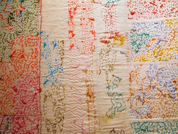 fabric artwork by Pacita Abad hanging at the Art Gallery of Ontario 