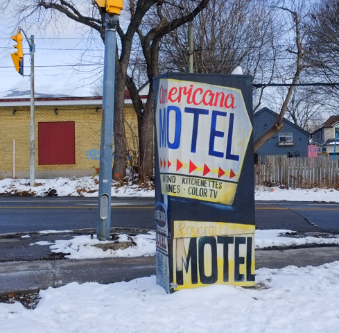 sidewalk box decorated with images of old motel signs, Kingston Rd and Brimley, Americana Motel