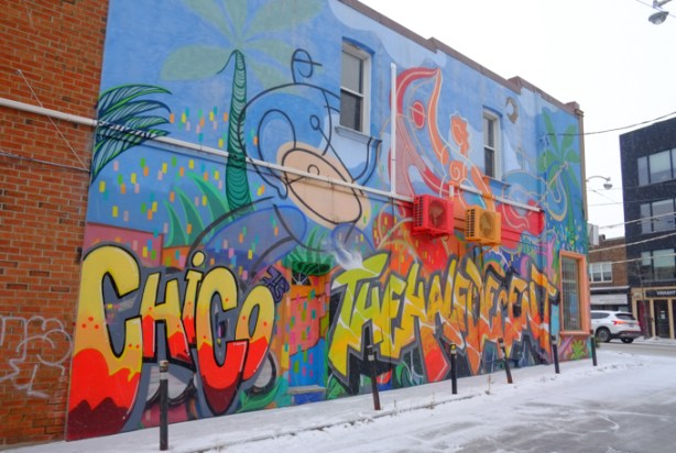 mural that has been tagged by the half decent, on federal street by dundas west 