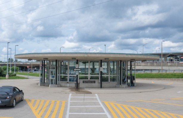 round flat building, wilson kiss and ride, where cars can dropoff and pick up passengers