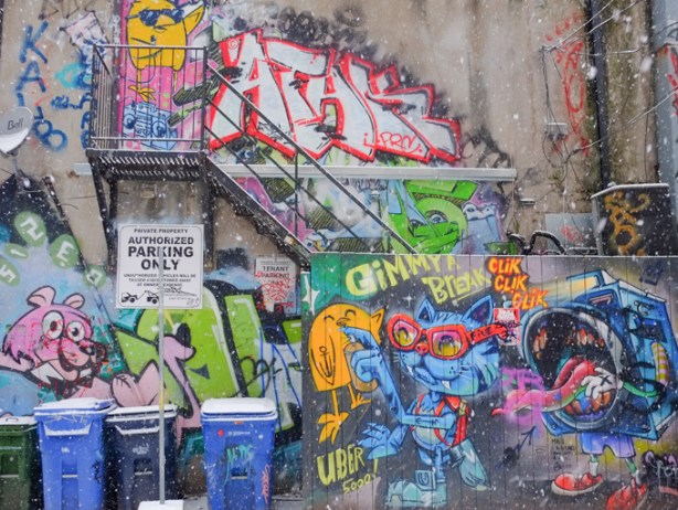 street art on a wall by stairs, pink panther, uber 5000 yellow bird, tags, also uber 5000 complaints about photographers