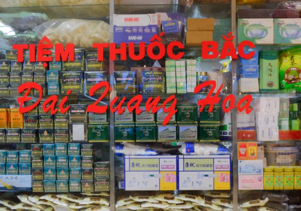 looking through front window of an Asian store, window is full of merchandise