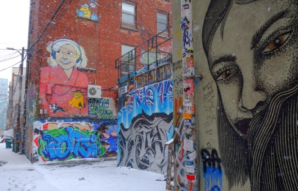 Graffiti Alley street art paintings, many, including uber 5000 walking dog and singing, 