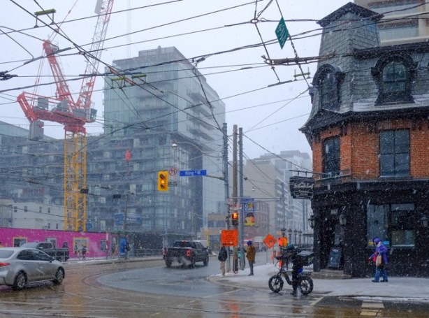 looking south on Bathurst from King, Wheatsheaf Tavern on the right, vacant lot where most of Banknote Bar was. now a metrolinx construction site