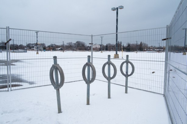 vacant lot, snow covered, on the east side of wilson subway station