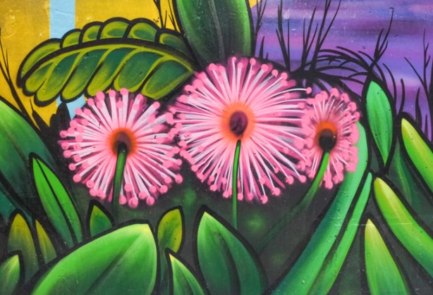 part of a mural, inside wilson station, of bright pink flower
