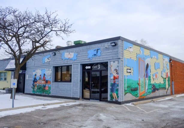 youth theme murals on low rise building, mural routes