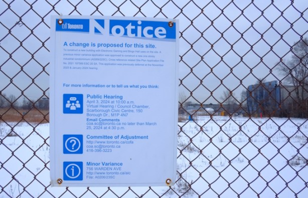 blue and white city of toronto development notice sign, 