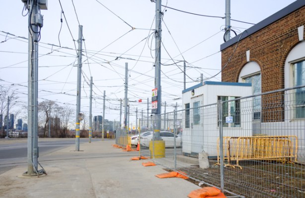 looking west along Queensway from Roncesvalles, lots of overhead streetcar wires