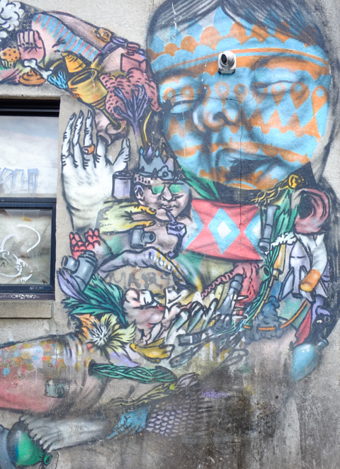 part of a Troy Lovegates mural in an alley behind Ossington Avenue in Toronto