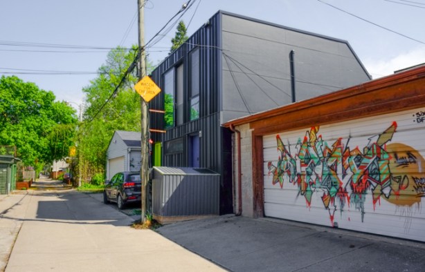 black box shaped house, new infill housing in an alley