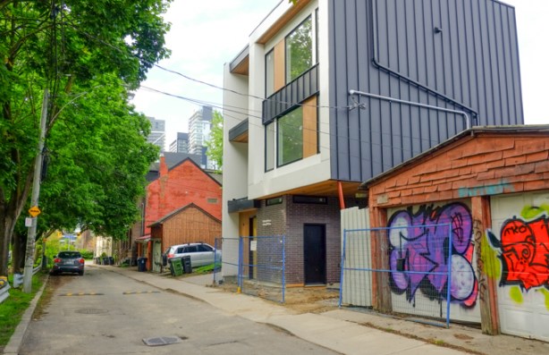 new three storey house on Stanley Terrace which is narrow street with park on the other side of the street