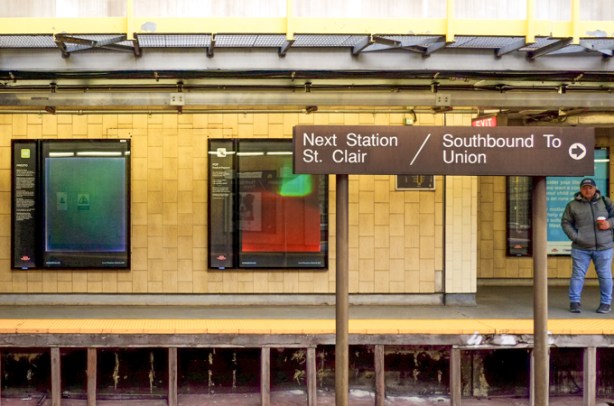 Davisville station, two art images in display cases usually used for ads