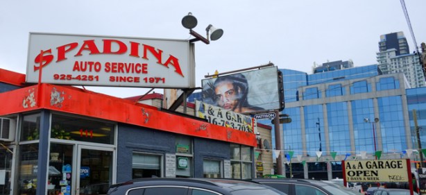 spadina auto service, mechanic, building, with large billboard above with image by Alanna Fields, art, for contact photo festival