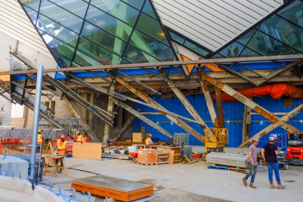 workmen and equipment, renovations of part of the crystal structure at the entrance to the art gallery of ontario