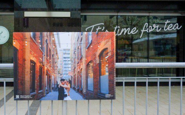 photo of a couple standing facing each other with arms wrapped around each other