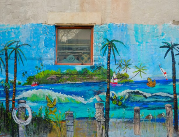 palm trees on the beach, part of a mural by B C Johnson in Gloucester Place